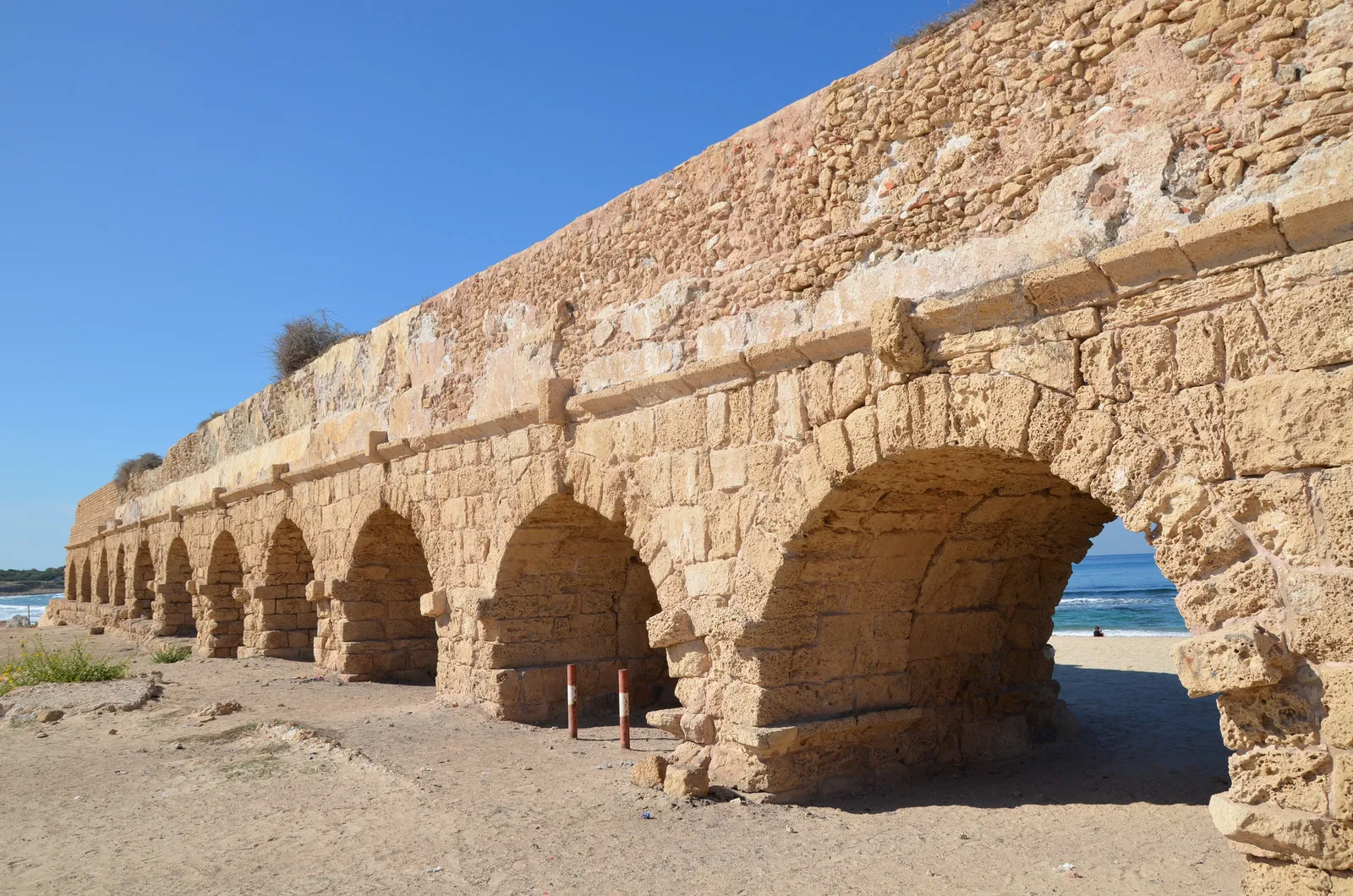 The Roman aqueduct at Caesarea marching along the beach